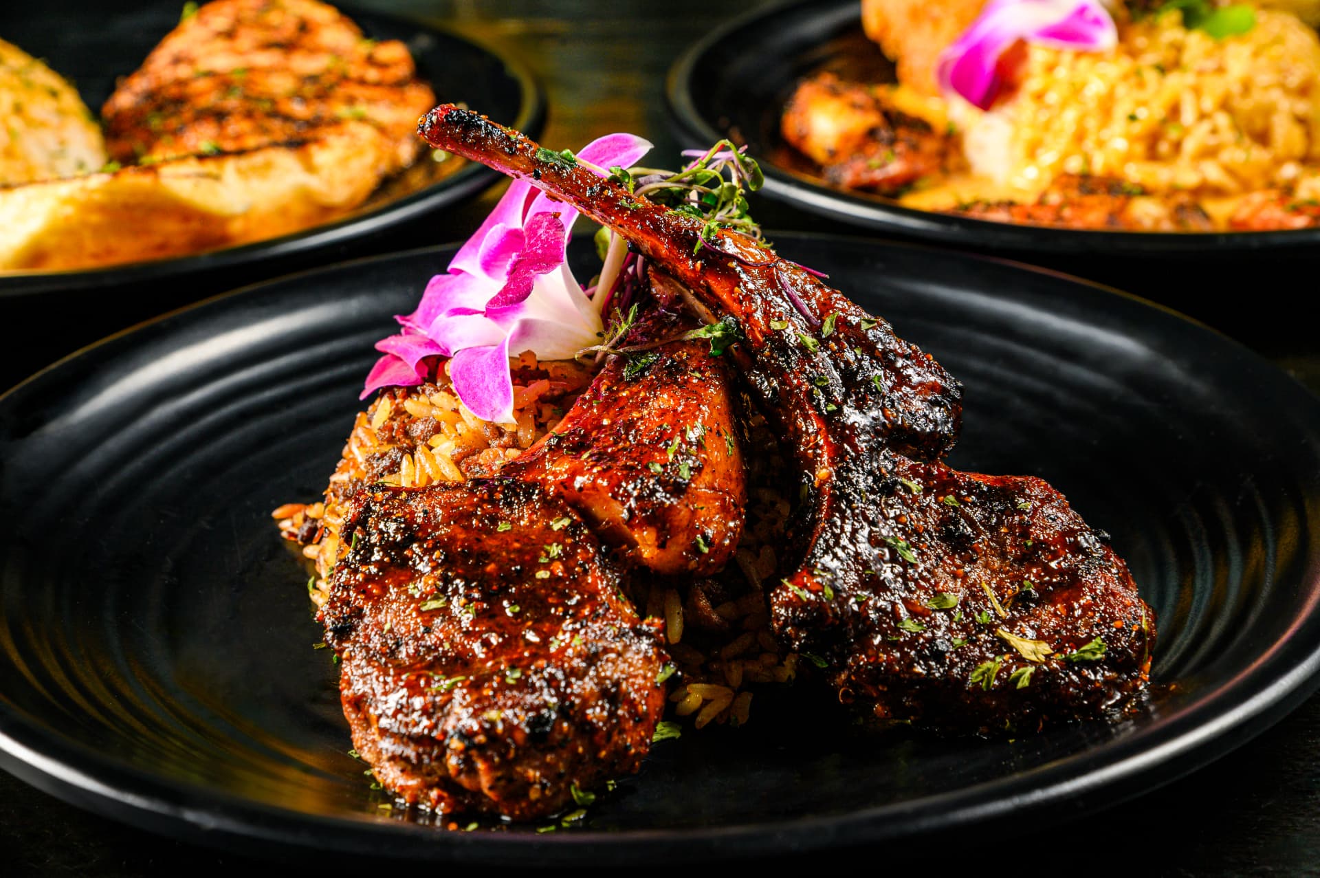 Gotti’s grilled lamb chops over dirty rice