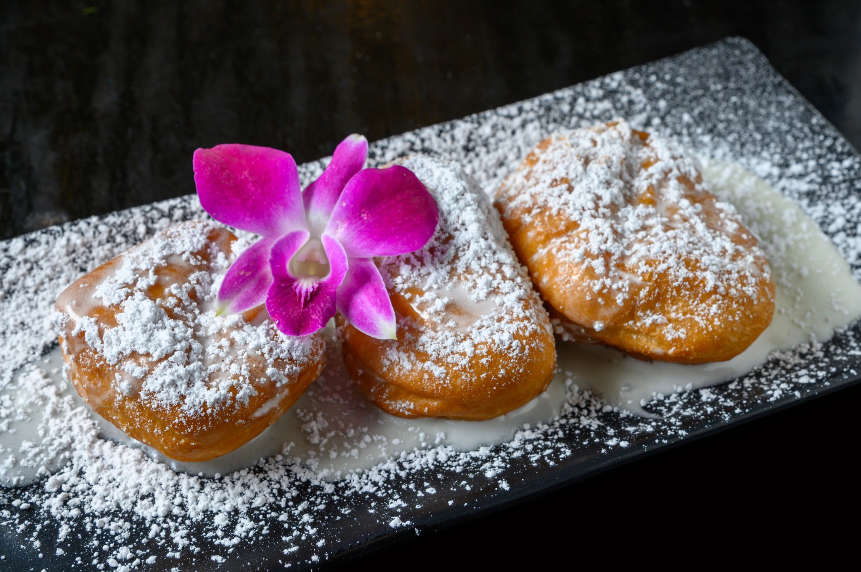 Gotti’s beignets dusted with powdered sugar