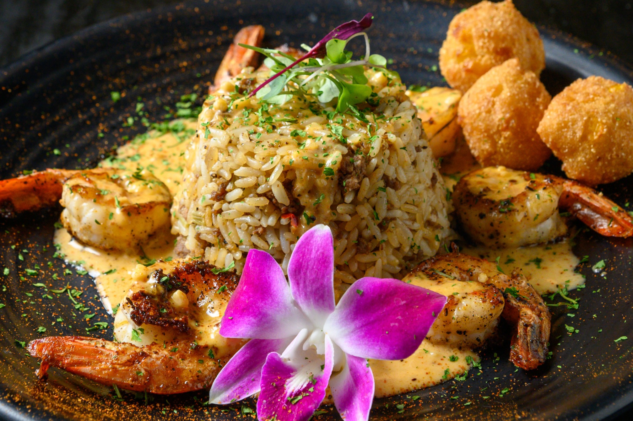 Gotti’s Shrimp Delight with dirty rice and hushpuppies