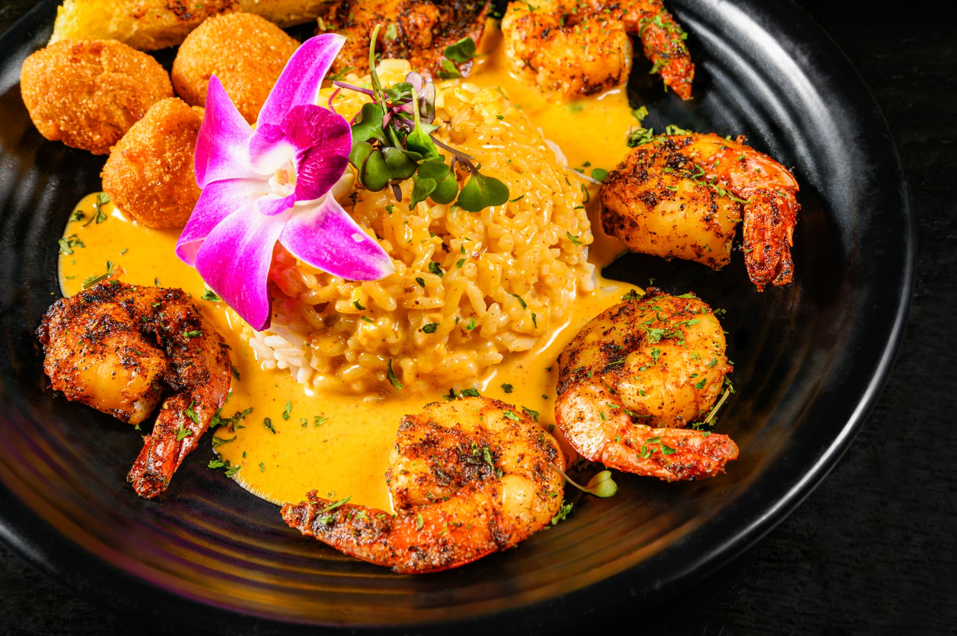 Gotti’s Shrimp Delight with rice and hushpuppies